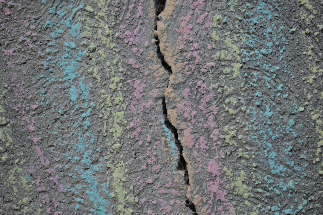Photo treatment of paint cracks